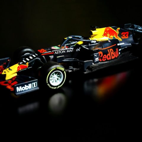 black and yellow f 1 car toy