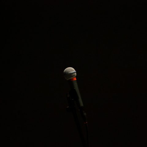 black corded microphone with stand