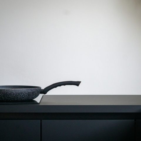 black leather chair on black wooden table